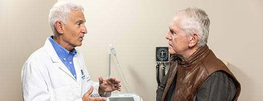 Dr. Stites meets with a patient